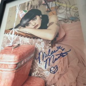 Melanie Martinez poster with her signature framed